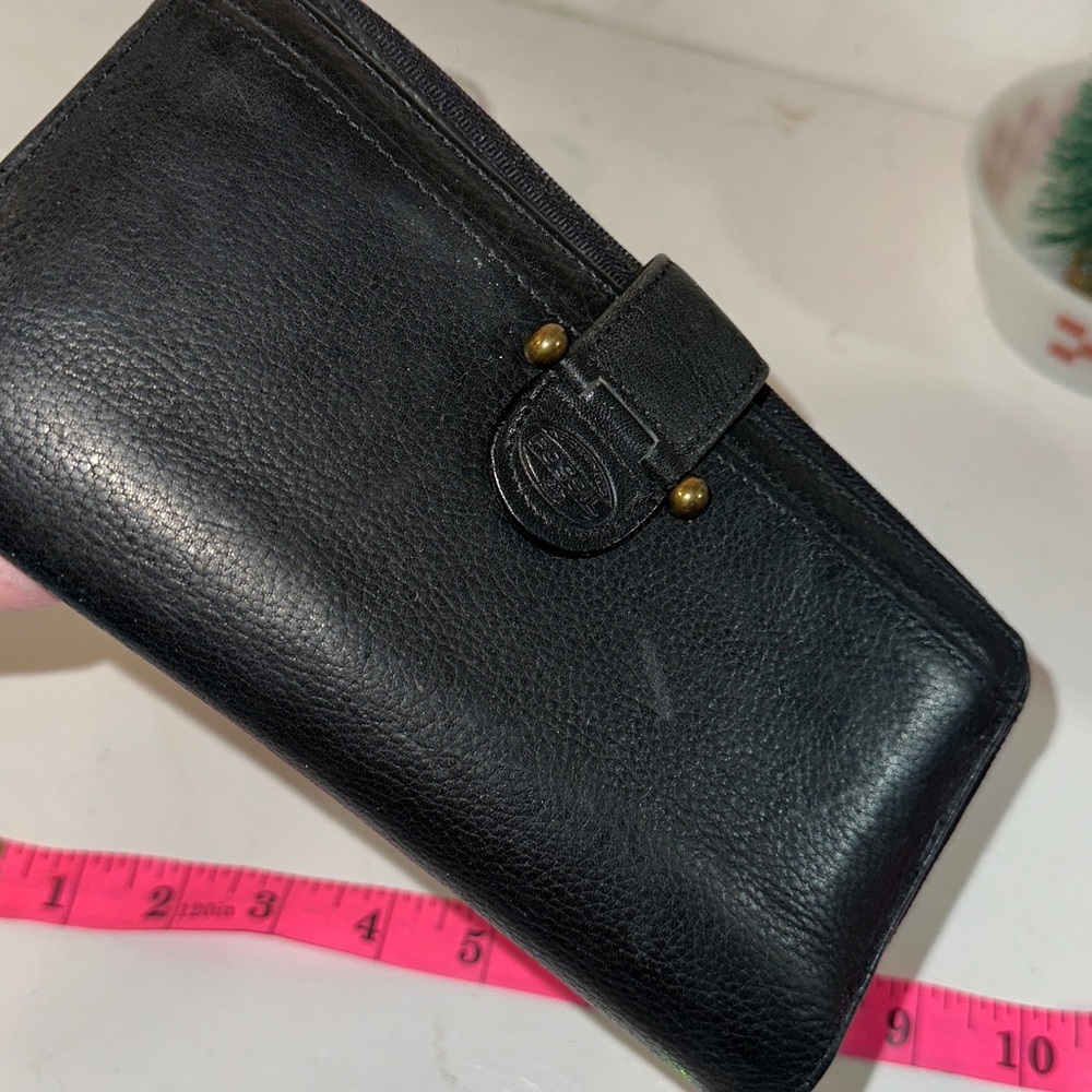 Fossil vintage black pebbled leather check book length wallet.
